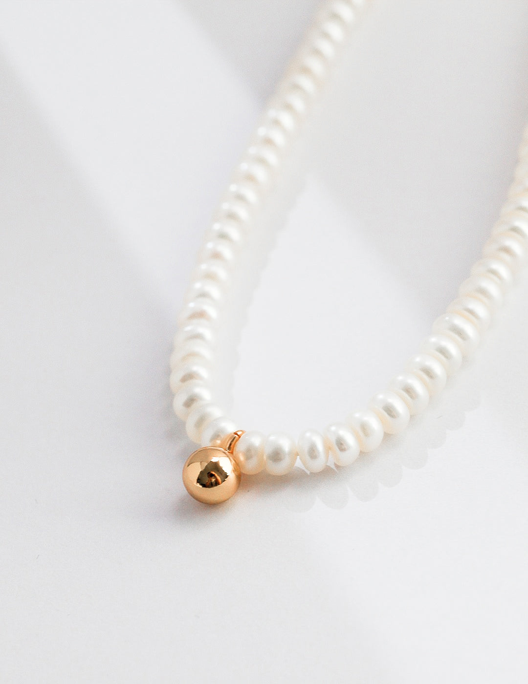 Pearl Elegance Gold Charm Necklace